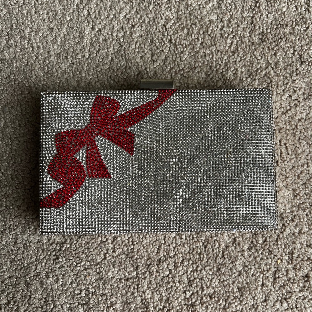 Silver Clutch with Red Bow Accent